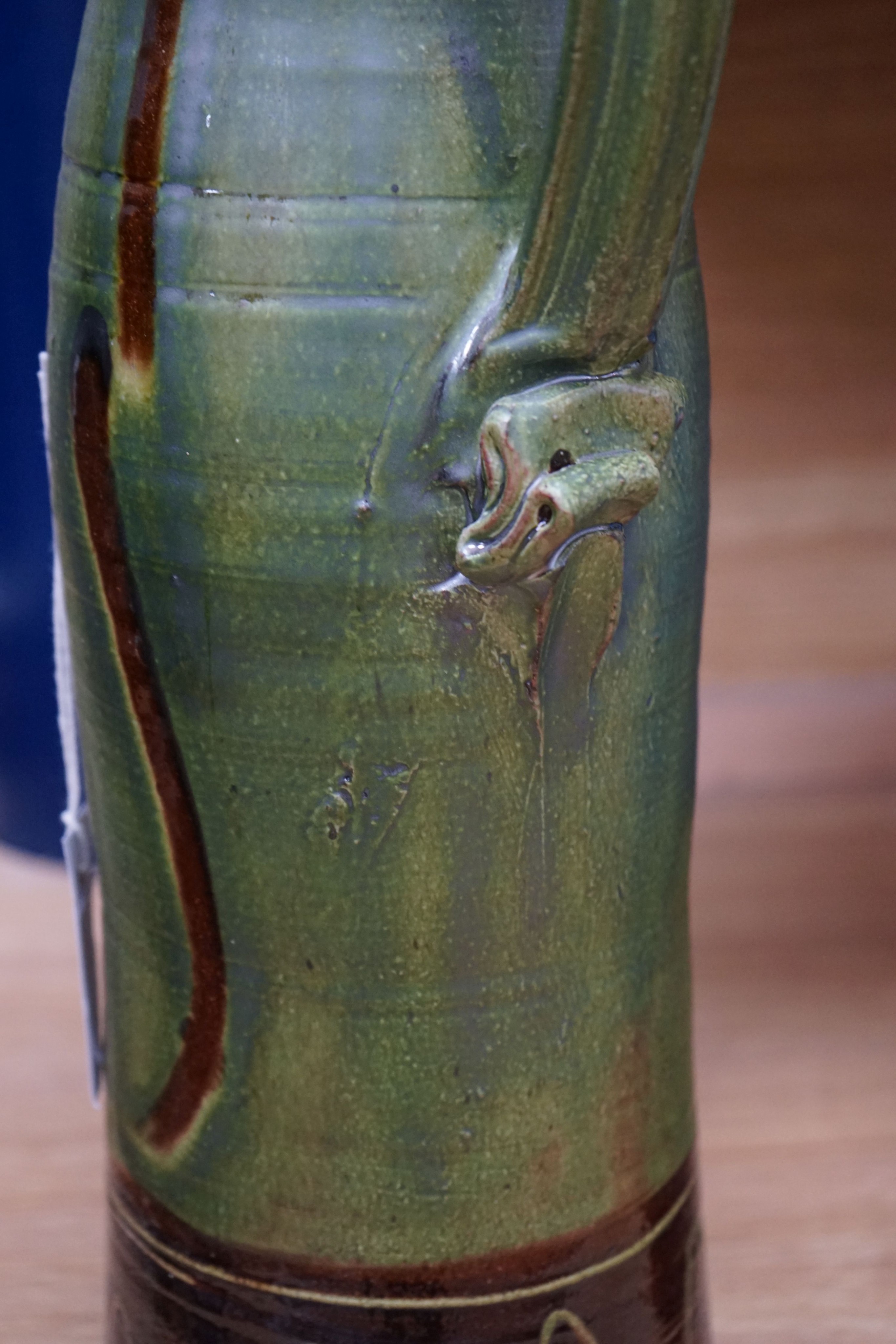 Clive Bowen (b.1943), a tall green glazed and brown slip decorated ewer, 59cm